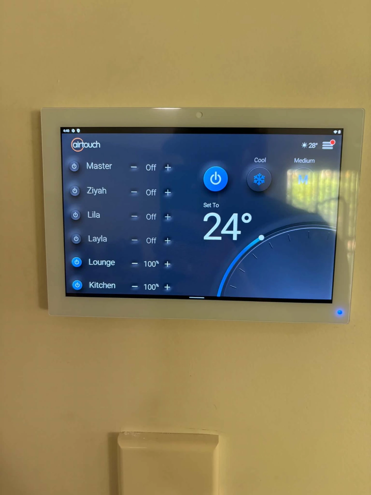 AirTouch zone controller for ducted air conditioning mounted on a wall